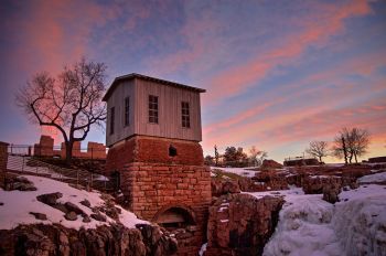 Even the southeast sky filled with color above Queen Bee Mill at Falls Park.