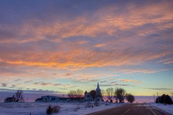 A bit further down the road as the clouds caught the setting sun’s last light.