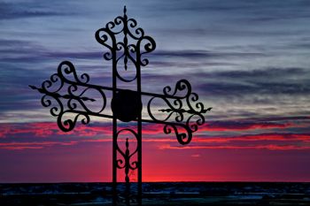 A beautiful iron cross in Holy Name's cemetery memorializes Elizabeth Swift Hawk, who died May 21, 1915 at age 77.