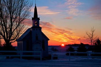 In front of West Nidaros is a replica of the old Nidaros Lutheran that still stands in Renner.