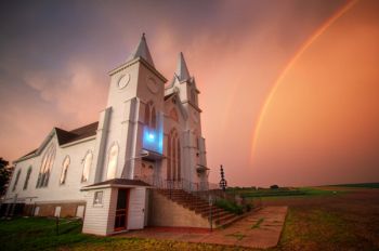 Faith United Lutheran Church and a rainbow.
