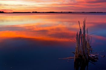 Sunset reflection at Mud Lake in Turner County.