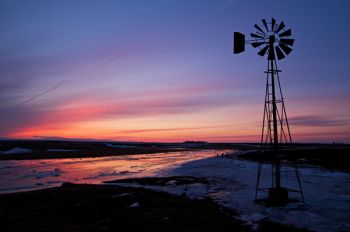 March sunset with iced over waterway in rural Turner County.