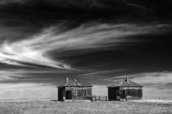 Twin school houses along the Wicksville road in rural Meade County.