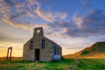 Chapel of the Holy Spirit. The bluff from which its stones were quarried stands to the right.