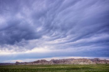Storm clouds brew southwest of the Conata Basin road in the Badlands.