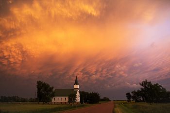 As the sun set, the light turned from yellow to orange.