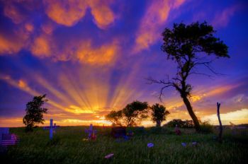 Beautiful after storm evening light over Buffalo Lake Church’s cemetery in rural Marshall County.