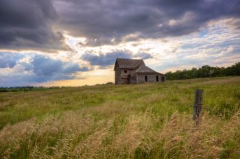 Small and fast moving clouds allowed for interesting shafts of light above this abandoned structure south of Summit.