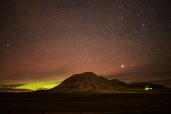 Faint northern lights above Bear Butte taken on September 26, just a few days after the equinox.