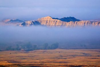 Low lying fog in the Sage Creek Wilderness of Badlands National Park.