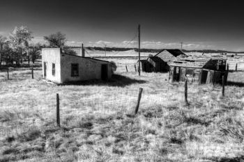 Abandoned business buildings of Dewey in southwest Custer County.