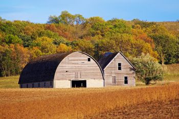 Marshall County barn with abandoned house.