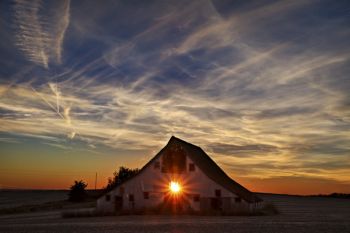 Sunset and unused barn west of Wakonda.