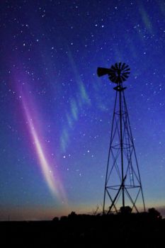 A major solar storm struck on June 6, 2013 while there was still a bit of light in the sky from the setting sun.