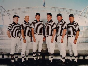 Colin Kapitan (left) reffed countless high school and college football and basketball games.