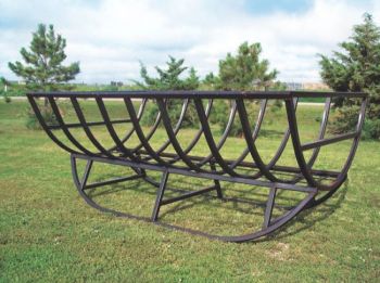 Kelly Melius and Bill Keldsen created this elevated Common Sense bale feeder in 1999. Photo by Kelly Melius.