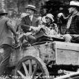 While in South Dakota, Silent Cal took a ride in a lumber wagon.