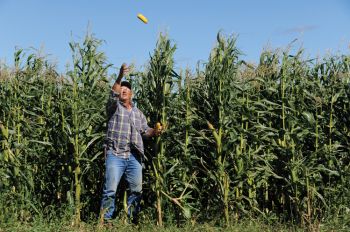 Jim Redder and his grandchildren, Abby and Ryan Mathiason, have won state titles in hand corn-picking contests. The Redders will host a corn-picking contest this fall at their farm northeast of Flandreau in Moody County.