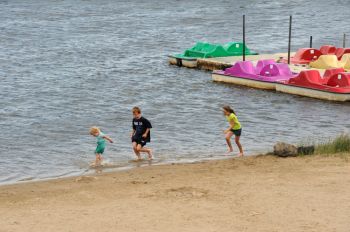 Cooling off during the dog days at Ravine Lake in Huron.