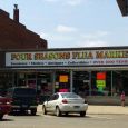 One opponent of Madison s thrift store proposal posted the Madville Times URL in her shop window. Photo by Cory Allen Heidelberger.