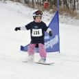 Participants in Media One Funski s popular snowboard slalom ranged in age from five to 50 and over.