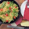 Garlic spaghetti with beans and arugula contains pantry staples jazzed up with a couple of garden-fresh favorites. Photo by Fran Hill.