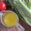 Tart lemon and fine bits of garlic create a bright dressing ideal for zinging up winter salads.
