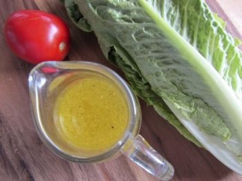 Tart lemon and fine bits of garlic create a bright dressing ideal for zinging up winter salads.