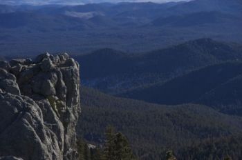 Black Elk Wilderness Area, named after the
Oglala Sioux Holy Man, was designated a
wilderness area in 1980. It encompasses
10,700 acres, including Harney Peak, highest
point east of the Rockies, which rises 7,242 feet
from the Wilderness center. Photo by Bernie Hunhoff.