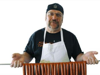 Gerard Heier (pictured) and his brother David's Hosmer meat market is better known for delicious sausage than for head cheese....for now, anyway. Photo by John Andrews.