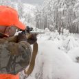 A hunter takes aim in the snowy Black Hills. S.D. Tourism photo.