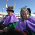 Grand Marshals Marvin Martilla and Lila Grape wear royal purple and Nile green, traditional colors of St. Urho s Day.
