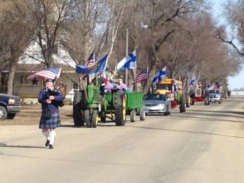 What began as a single-car parade decades ago has grown to include several entries.