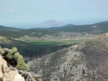 Bear Butte in the distance.