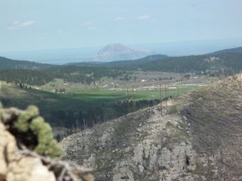 Bear Butte in the distance.