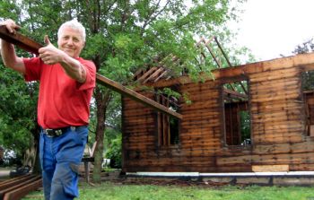 Leif Arne Holen of Norway helped disassemble and pack the Leet school for the overseas trip to Norway in 2007. 