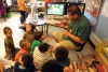 Toby Godoy came to North Elementary to teach the youngsters how to stitch cloth heads for the drum sticks.