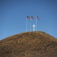 Flags fly on a butte above the little reservation town of Rock Creek.