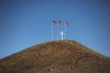 Flags fly on a butte above the little reservation town of Rock Creek.