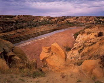 Dr. Blanchard finds wisdom in the constant changing landscape of the North Dakota Bad Lands in Teddy Roosevelt National Park. Photo courtesy of ND Tourism.