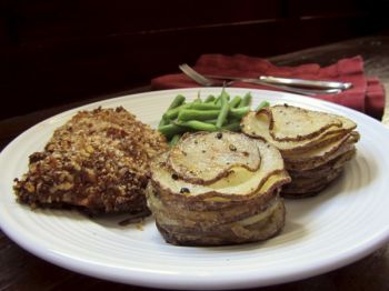 With the right gadgets, cooking up pecan-crusted chicken with au gratin potato stacks is a snap. Photo by Fran Hill.