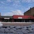 Sandbags have lined both sides of Pierre s main street all summer long, but as it turned out the water boiled up from underneath, causing damage to the stores  basements.
