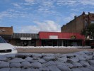 Sandbags have lined both sides of Pierre s main street all summer long, but as it turned out the water boiled up from underneath, causing damage to the stores  basements.