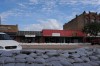 Sandbags have lined both sides of Pierre s main street all summer long, but as it turned out the water boiled up from underneath, causing damage to the stores  basements.