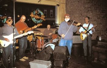 The Poker Alice Band in 2004: Nick Schwebach, Larry Rohrer, Al Remund, Owen DeJong and Dennis Johnson. Photo by Jerry Wilson.