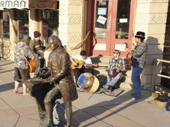 A group of street musicians, with Thomas Jefferson sitting in on quill. <a href='http://www.hlavka.com/' target='_blank'> Edward Hlavka</a> sculpted the Sage of Monticello for Rapid City's <a href='http://www.visitrapidcity.com/whattodo/thecityofpresidents/' target='_blank'> City of Presidents</a>, a series of life-size bronzes of the men who have held our country's highest office.