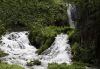 Ron Linton shared this photo of Roughlock Falls, the most popular falls in Spearfish Canyon. The name dates to pioneer days when a steep road by the creek forced wagon drivers to  rough lock  (chain a wagon wheel to control the weight of the load).