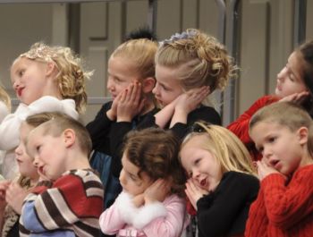 Students at Sacred Heart Elementary in Yankton sang songs of the season. Photo by Bernie Hunhoff.