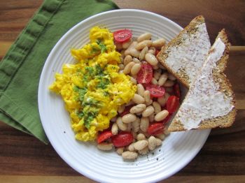 Dream of that new front porch over a breakfast of scrambled eggs with pesto and white beans.